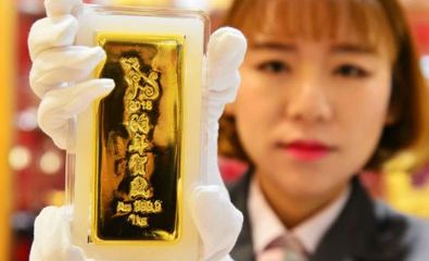 贺岁市场热卖狗年金条，贵金属投资迎新春热潮
